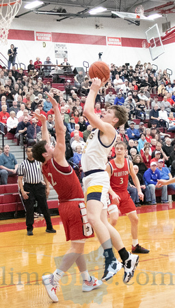 Ottawa-Glandorf's Dave Westrick (#32) shoots as Bluffton's Carso