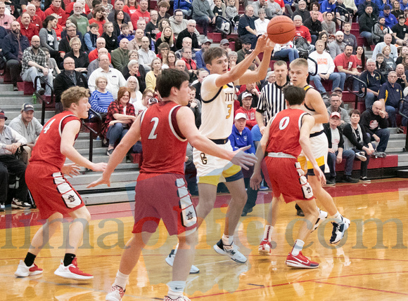 Ottawa-Glandorf's Dave Westrick (#32) passes the ball away from