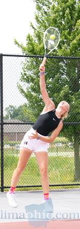 Abigail Beck serves the ball to her opponent on Sunday morning a
