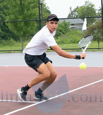 Lucas Perez returns the ball to his opponent on Sunday morning at the LATA Lima City Mens Singles Te
