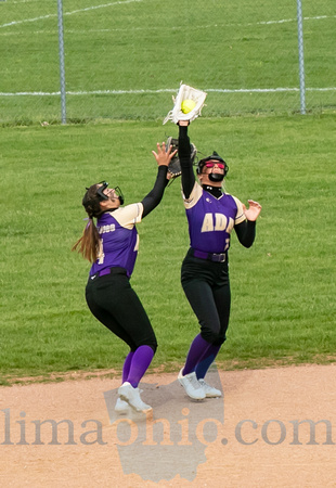 Ada Senior, Kayla Wince (#7) catches a fly ball as teammate Karl