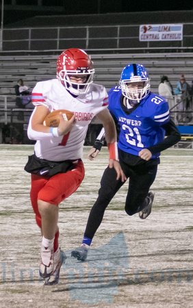 LCC's Carson Parker carries the ball as Antwerp's Landon Brewer
