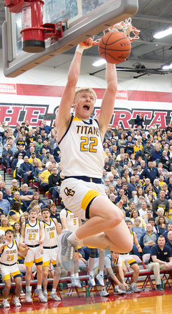 Ottawa-Glandorf's Colin White slam dunks on Wednesday night at t